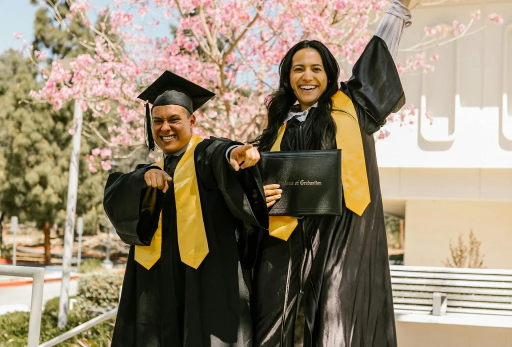 High school graduates in caps and gowns