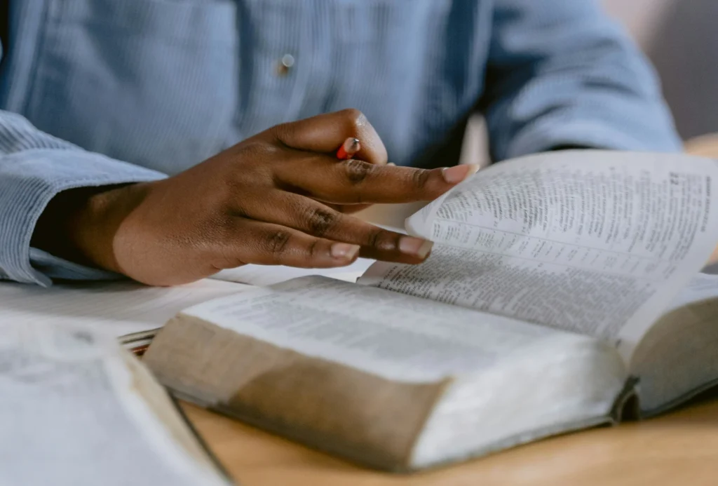 man studying a book